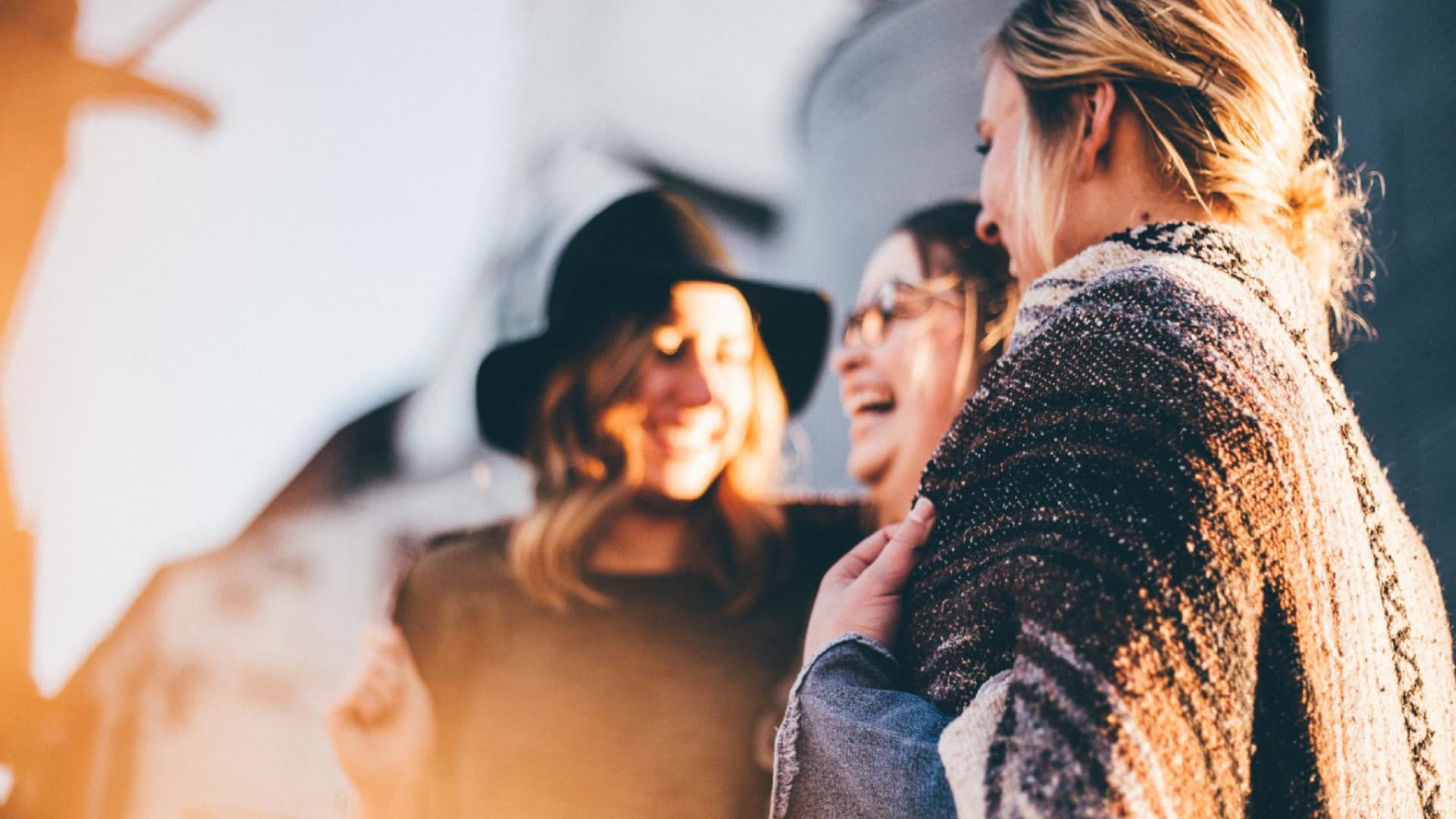 3 woman laughing together