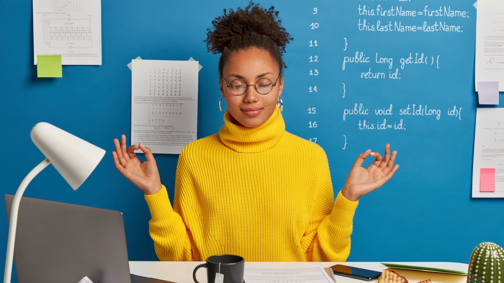 woman meditating in office